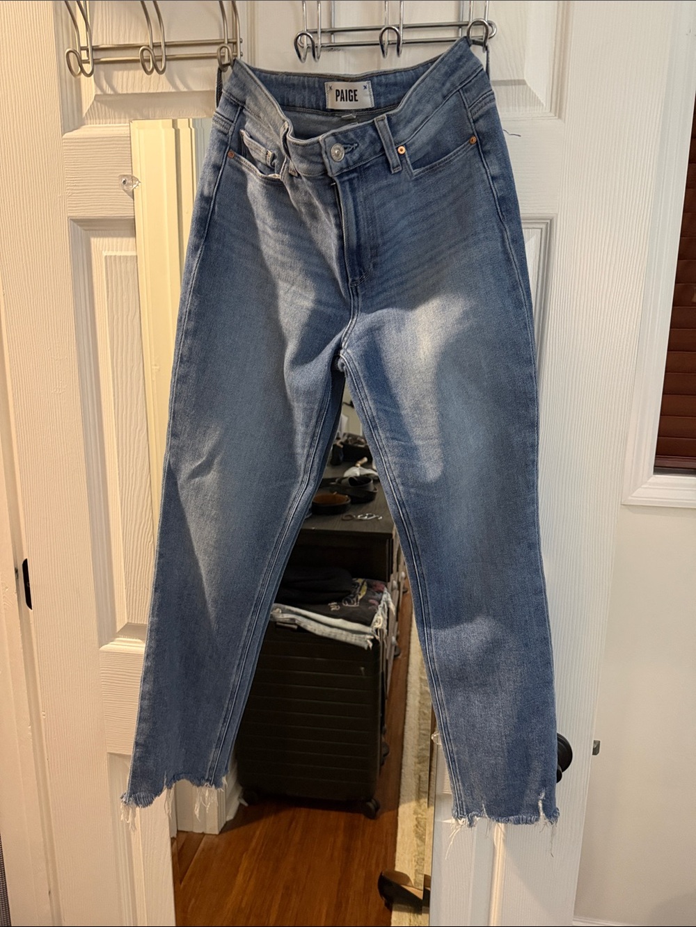 PAIGE Cropped Frayed Hem Jeans in Light Blue Wash